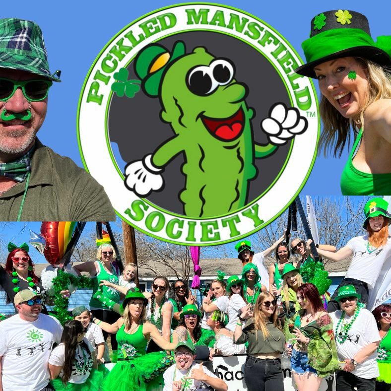 A group of people in green hats and shirts.